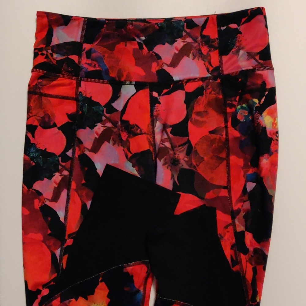 Athleta leggings with mesh , Size M